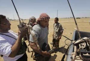 Líbya: Povstalci tajne rokujú s protivládnou opozíciou
