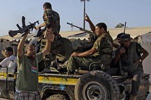 Líbya: Povstalci sa dostali pred Kaddáfího rodné mesto